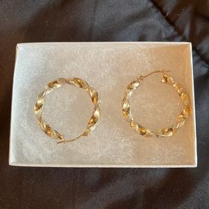 Sterling silver hoops with 10 karat gold overlay